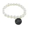 Bijoux personnalis&eacute;s: Bracelet en argent personnalis&eacute; avec m&eacute;daille