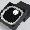 Bijoux personnalis&eacute;s: Bracelet en argent personnalis&eacute; avec m&eacute;daille