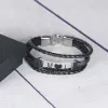 Bracelet grav&eacute; en acier et cuir : Bracelet grav&eacute; en acier et cuir 