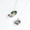 Bijoux personnalis&eacute;s: Pendentif c&oelig;ur en argent grav&eacute; pour 2 photos