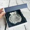 Cadeaux avec le nom: Coquillage de bapt&ecirc;me en argent personnalis&eacute;