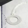 Bijoux personnalis&eacute;s: Pendentif disque en argent pour professeur