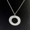 Bijoux personnalis&eacute;s: Pendentif disque en argent pour professeur