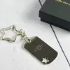 Bijoux personnalis&eacute;s: Porte-cl&eacute;s grav&eacute; avec &eacute;toile