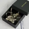 Bijoux personnalis&eacute;s: Porte-cl&eacute;s moto grav&eacute;