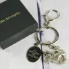 Bijoux personnalis&eacute;s: Porte-cl&eacute;s moto grav&eacute;