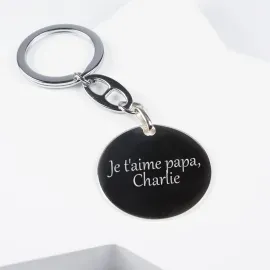 Porte-clés en argent gravé
