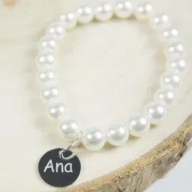 Bracelet de perles avec médaille en argent gravée