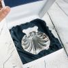 Cadeaux avec le nom: Coquillage de baptême en argent personnalisé
